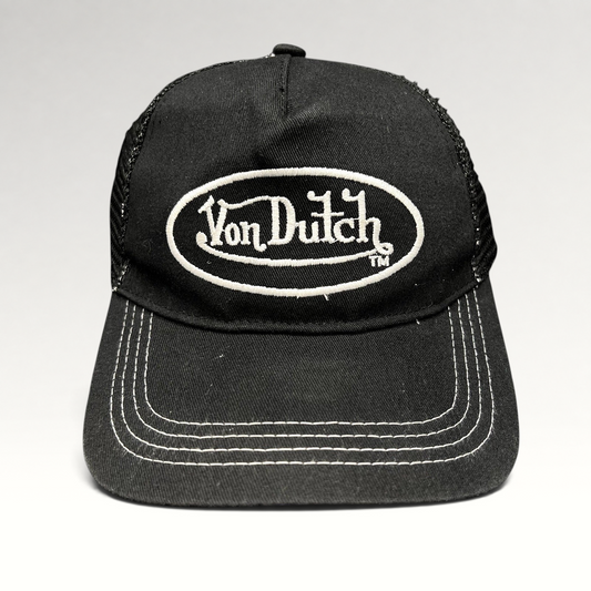 Raree Finds vintage Von Dutch black and white trucker hat with embroidered oval logo and contrast stitching.