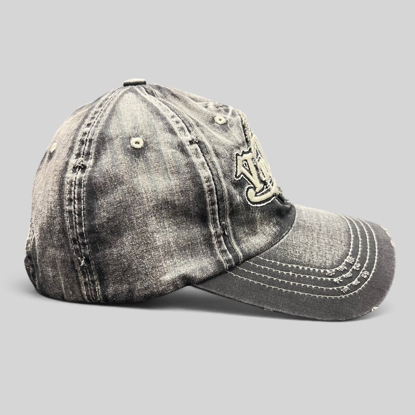Raree Finds Von Dutch distressed black and grey acid-wash denim strapback cap with heavy contrast stitching