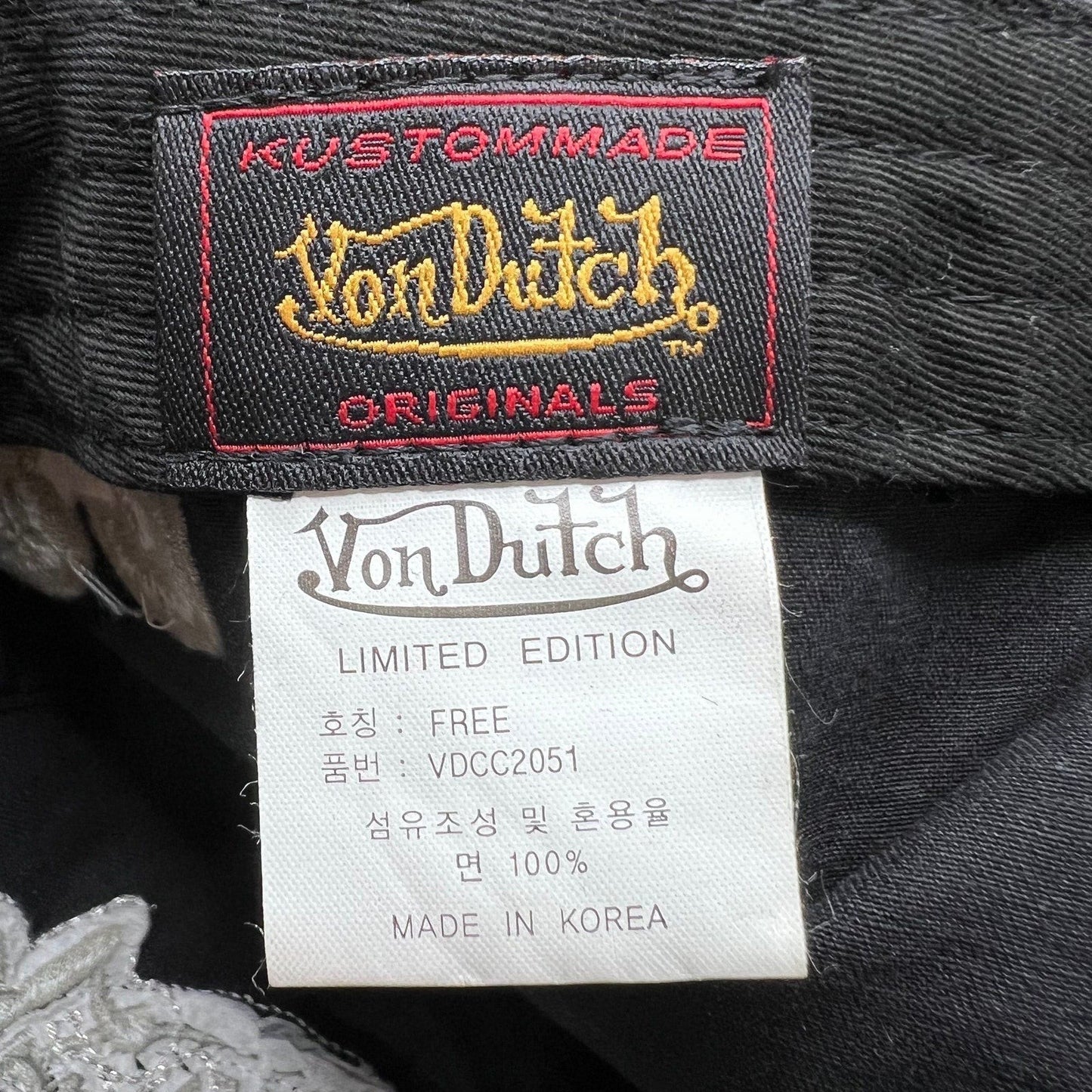 Raree Finds Von Dutch Limited Edition hat interior label showing 100% cotton construction and Made in Korea tag.