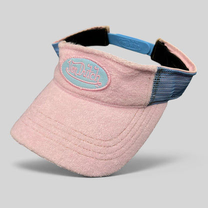 Raree Finds vintage Von Dutch Y2K pink and blue terry cloth visor with an oval logo patch and plastic strapback.