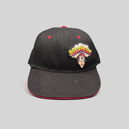 Raree Finds vintage Y2K Warheads candy promo hat with black crown, red brim, and embroidered logo on Otto Flex base