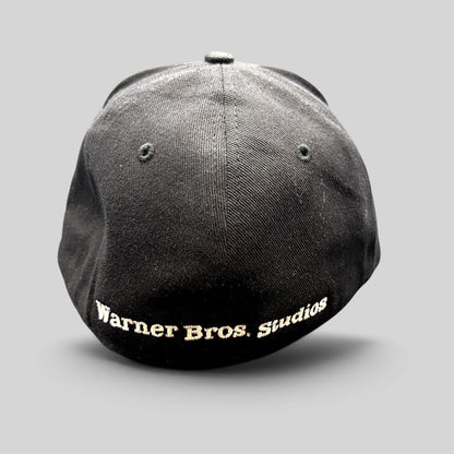 Raree Finds black fitted hat with Warner Bros. Studios embroidered on the back in white lettering