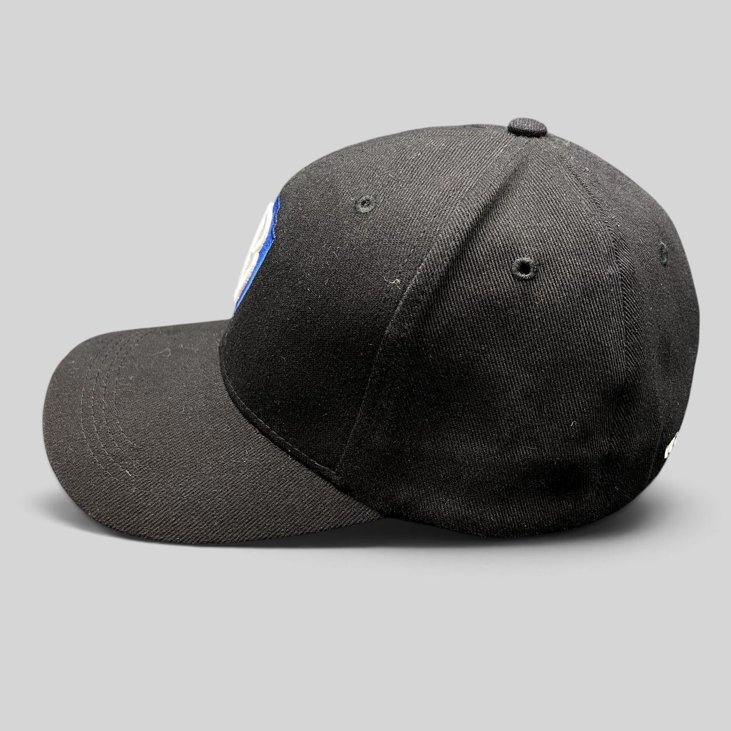 Raree Finds Warner Bros Studio Tour Hollywood fitted cap in black with blue and silver embroidered WB shield logo