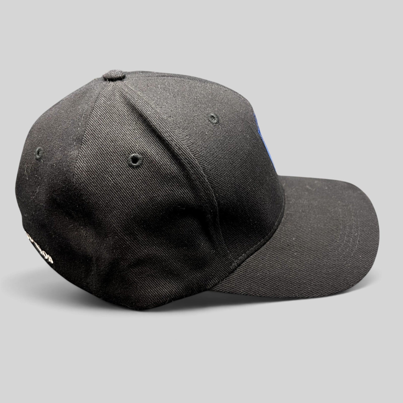 Raree Finds Warner Bros Studio Tour Hollywood fitted hat in black with blue and silver embroidered WB shield logo