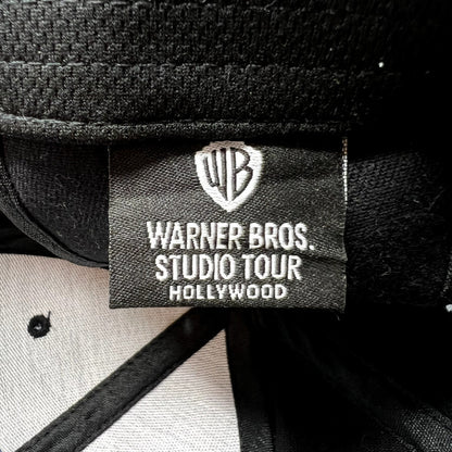 Raree Finds Warner Bros Studio Tour Hollywood hat interior label with WB shield logo on black fabric