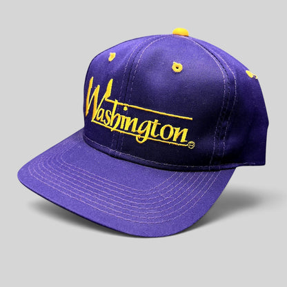 Raree Finds vintage Washington Huskies snapback hat in purple with gold embroidered script and green undervisor.