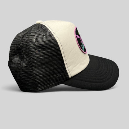 Raree Finds What We Do In The Shadows promo trucker hat in black and cream with gothic bat-winged skull patch