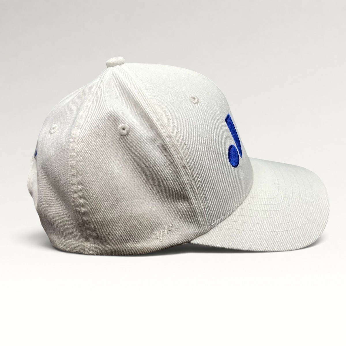 Raree Finds white Flexfit NU snapback hat with royal blue embroidered logo on the side panel