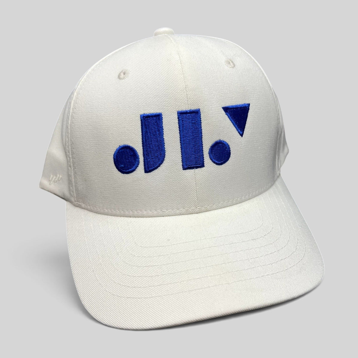 Raree Finds white Flexfit NU snapback hat with a royal blue geometric logo embroidered on the front structured crown.