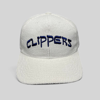 Raree Finds white corduroy Los Angeles Clippers strapback hat with royal blue embroidered wordmark on the front
