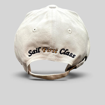 Raree Finds white cotton strapback cap with Sail First Class embroidery on the back and brass buckle closure