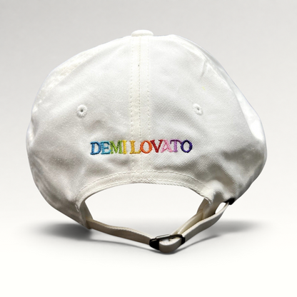 Raree Finds white strapback hat with multicolor Demi Lovato embroidery on the back and adjustable metal strap closure