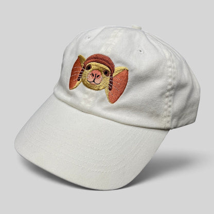 Raree Finds white cotton strapback hat featuring an embroidered Despereaux mouse character from the 2008 movie.