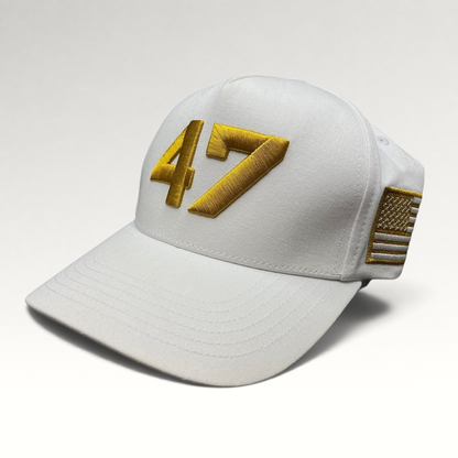 Raree Finds white cotton snapback hat with gold 47 embroidery and a gold American flag patch on the side.