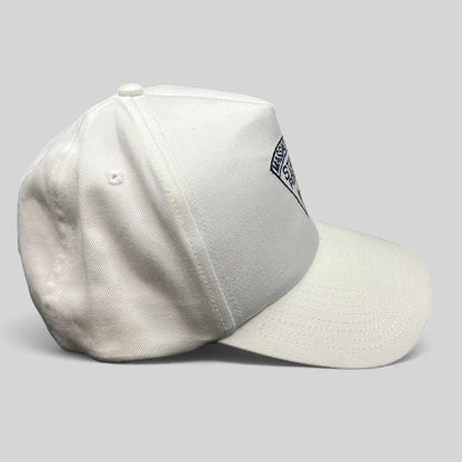 Raree Finds vintage white Massachusetts State Police snapback hat with embroidered triangular insignia, side view.