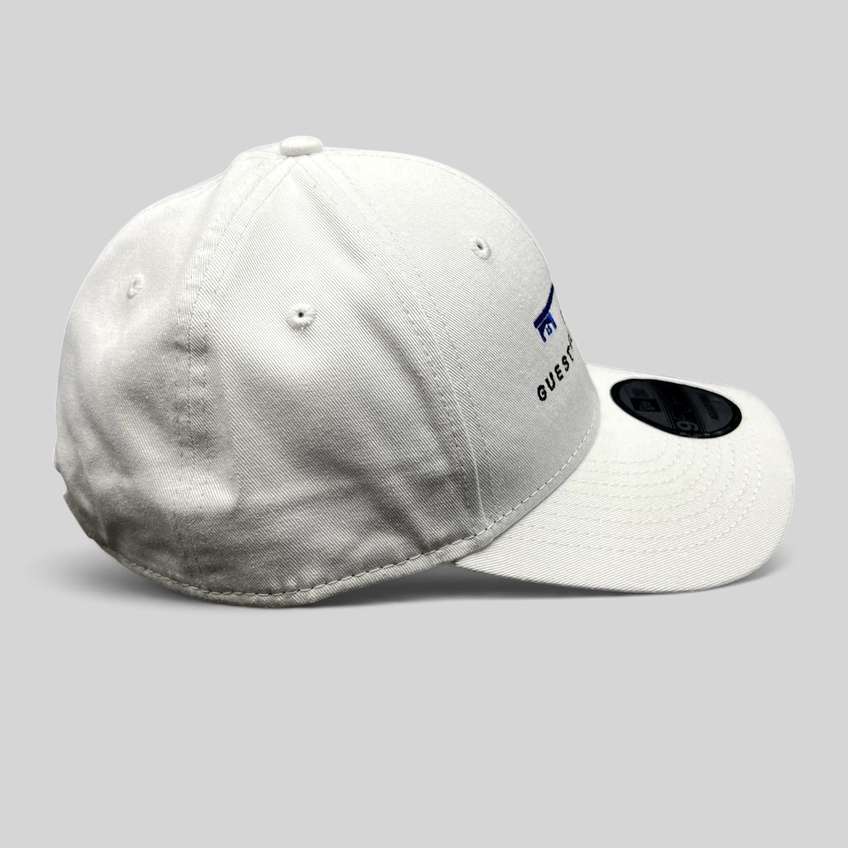 Raree Finds white New Era 9FORTY strapback hat with blue key logo and The Guest House Ocala embroidery