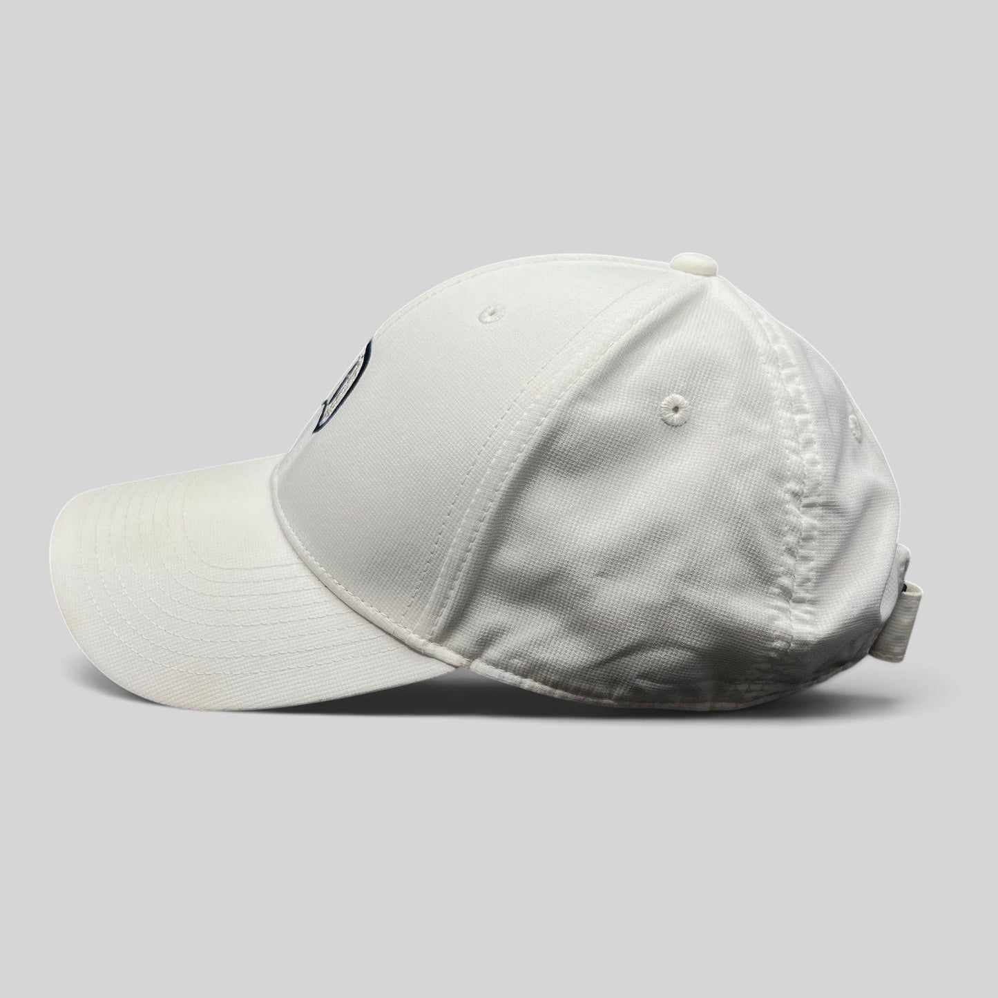 Raree Finds white Nike Legacy 91 Disney collaboration cap with embroidered D logo and adjustable strapback closure