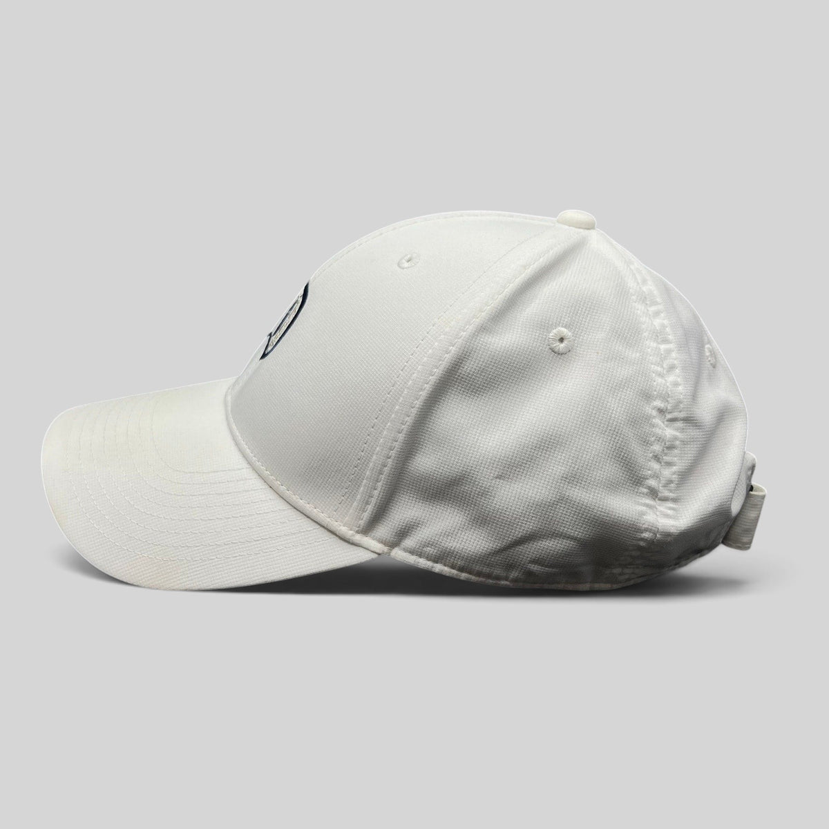 Raree Finds white Nike Legacy 91 Disney collaboration cap with embroidered D logo and adjustable strapback closure