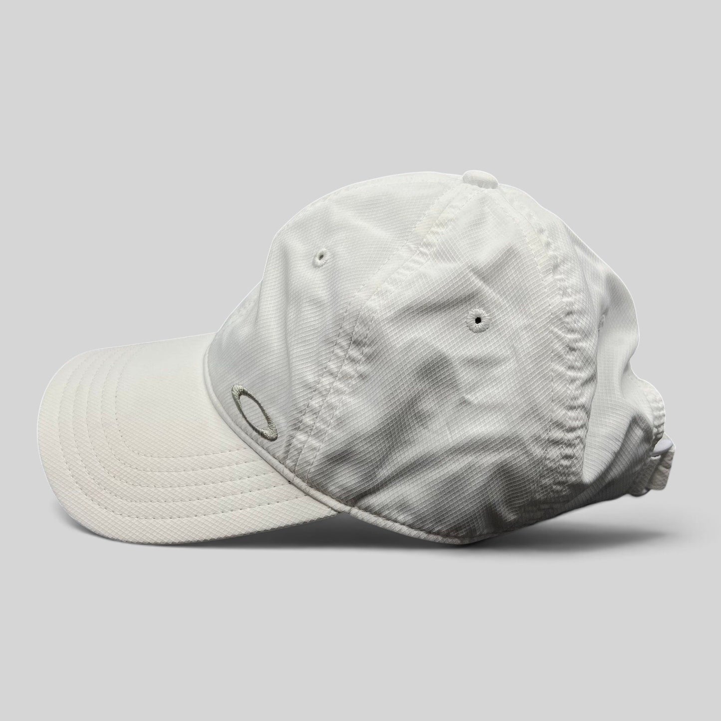 Raree Finds white Oakley Hydrolix performance hat with moisture-wicking polyester fabric and side logo detail