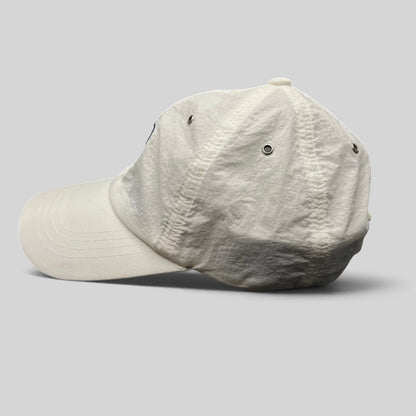 Raree Finds white Palace Skateboards nylon strapback hat with side profile view and metal eyelets