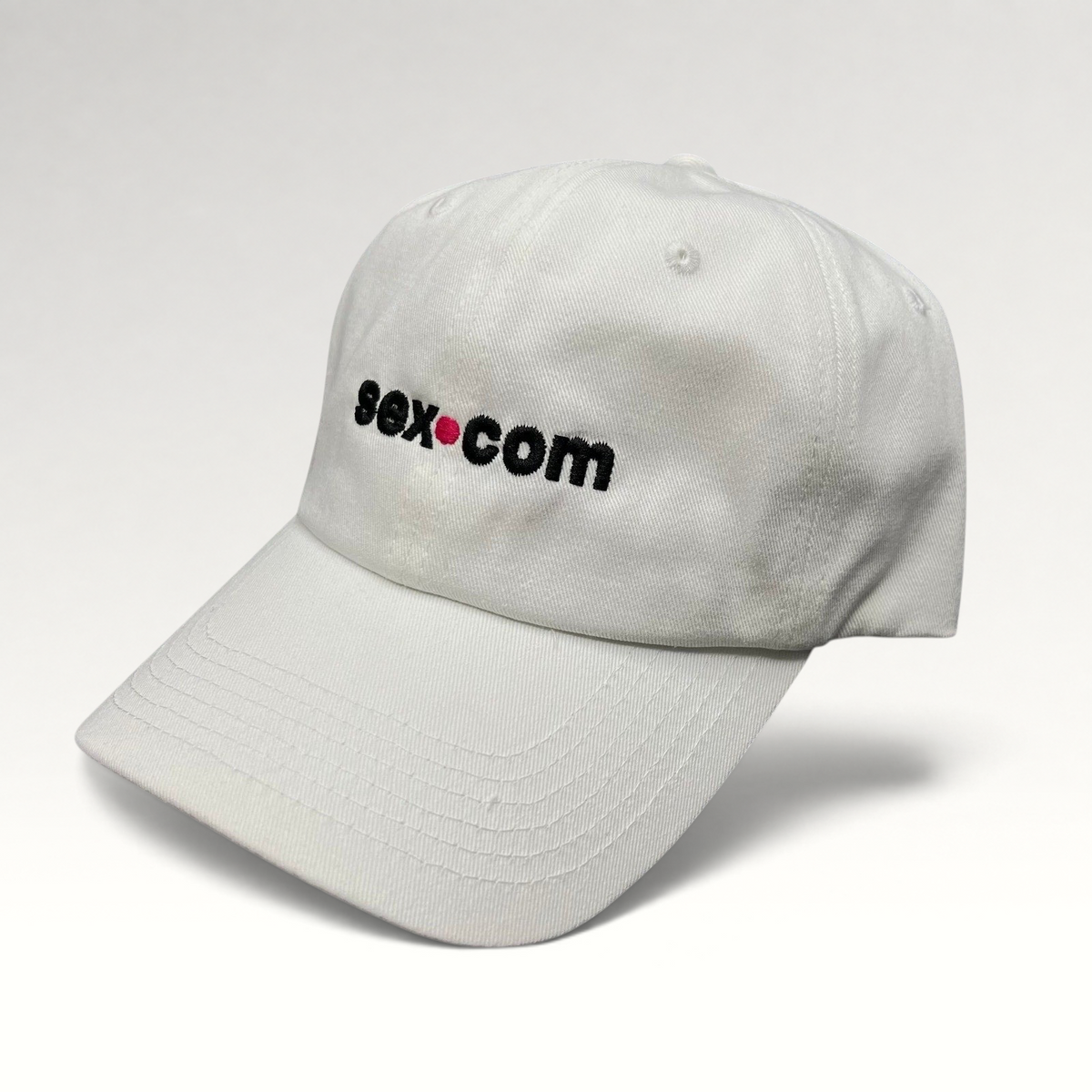 Raree Finds white cotton dad cap featuring embroidered black and red sex.com logo with adjustable brass strapback