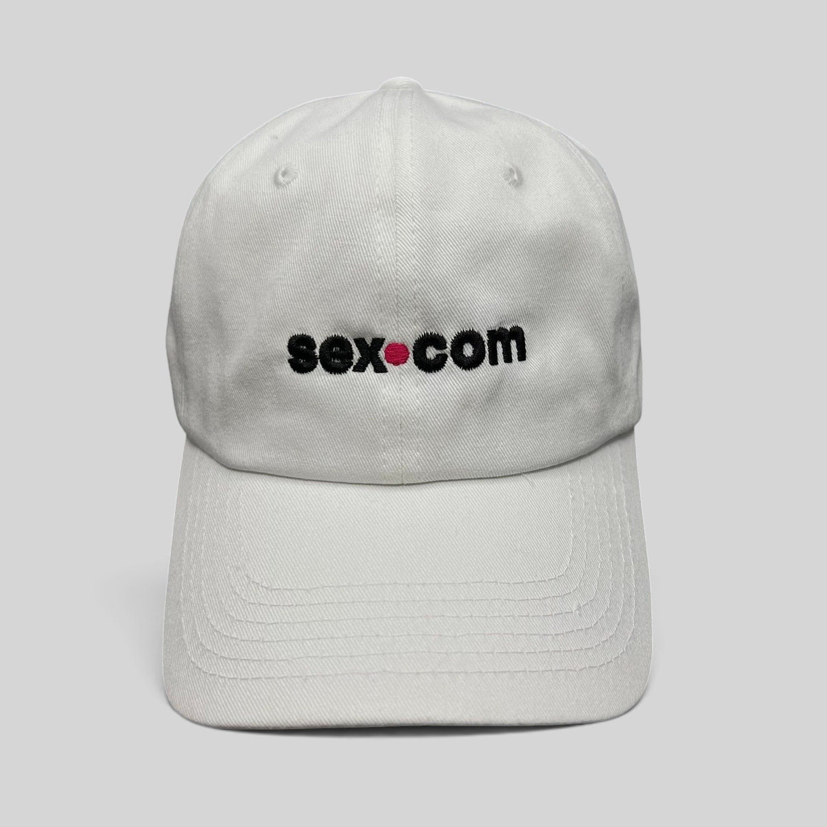 Raree Finds white cotton dad cap featuring embroidered sex.com logo with red accent and adjustable brass strapback