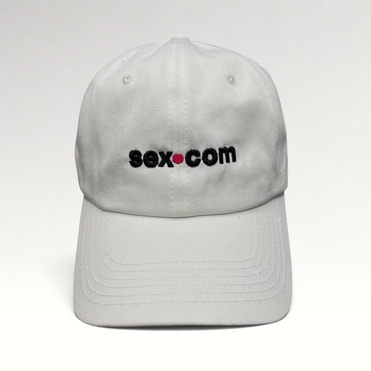 Raree Finds white cotton dad cap featuring embroidered sex.com logo with red accent and adjustable brass strapback