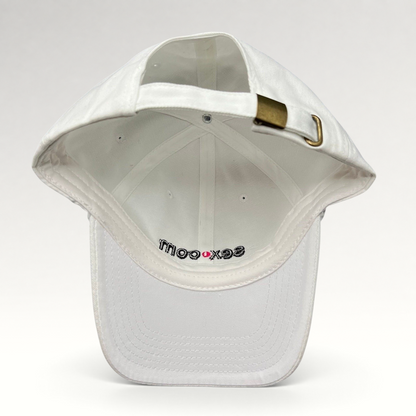 Raree Finds white cotton dad cap with adjustable strapback and brass buckle, showing interior logo embroidery