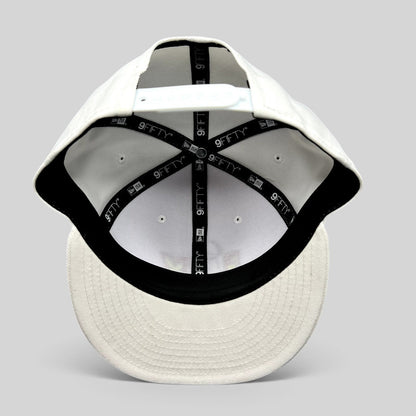 Raree Finds New Era Super Bowl LIX white 9FIFTY snapback hat interior view showing branded taping and adjustable strap