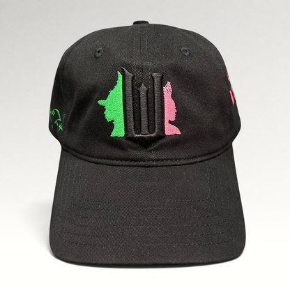 Raree Finds black cotton Wicked Broadway musical cap with green and pink character embroidery and gothic W emblem