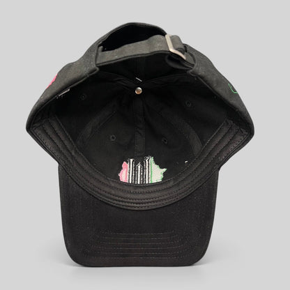 Raree Finds Wicked Broadway musical black cotton strapback hat with green and pink interior embroidery detail