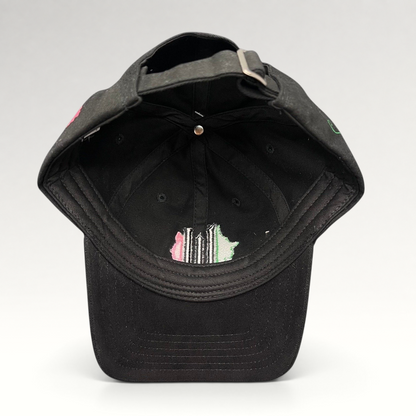 Raree Finds Wicked Broadway musical black cotton strapback hat with green and pink interior embroidery detail