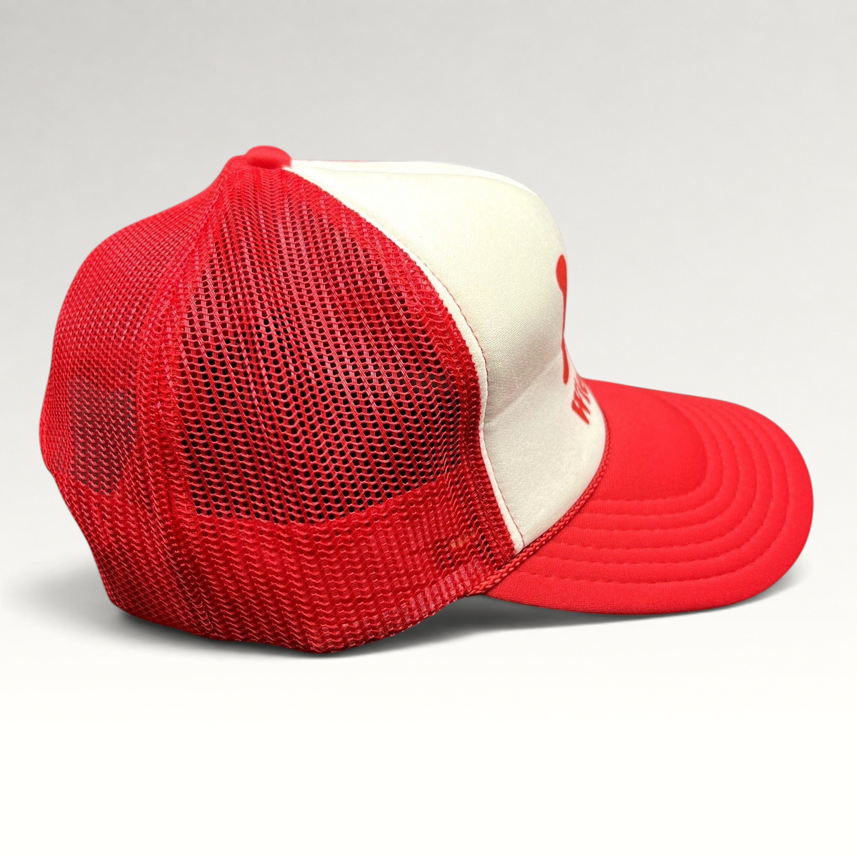 Raree Finds vintage Wienerschnitzel red and white foam trucker hat with mesh back and curved brim side view