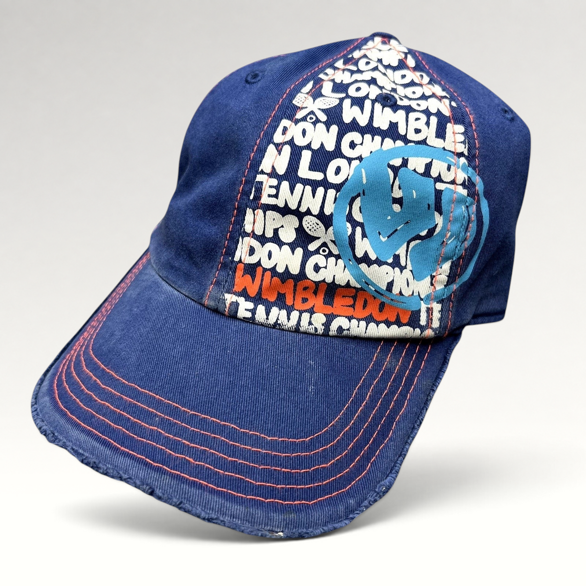 Raree Finds navy and orange distressed strapback hat with Wimbledon graphic print and frayed edges