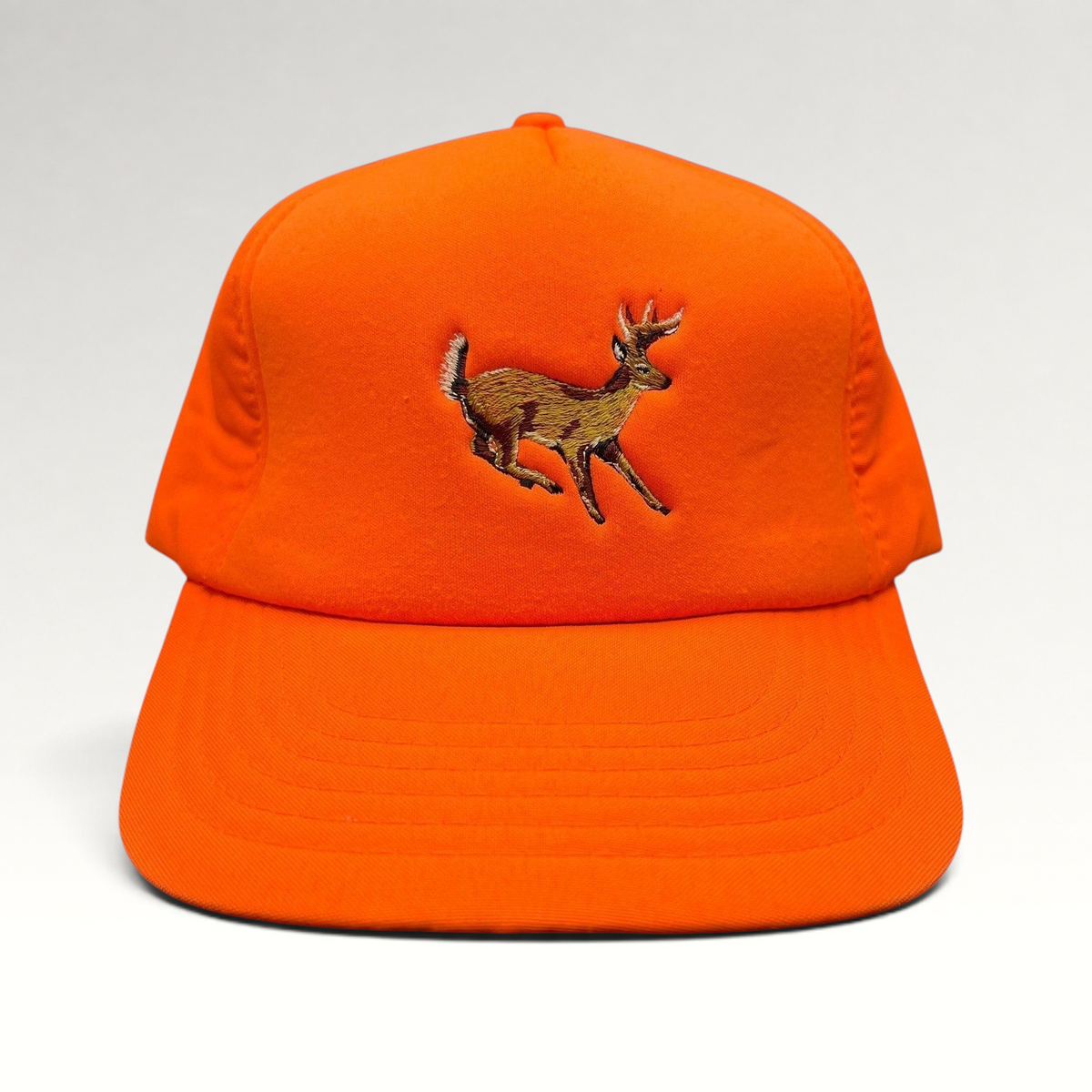 Raree Finds vintage Winchester blaze orange hunting snapback hat with an embroidered running deer graphic.