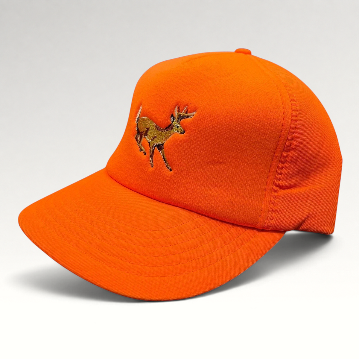 Raree Finds vintage Winchester blaze orange hunting snapback hat with embroidered deer logo and green undervisor.