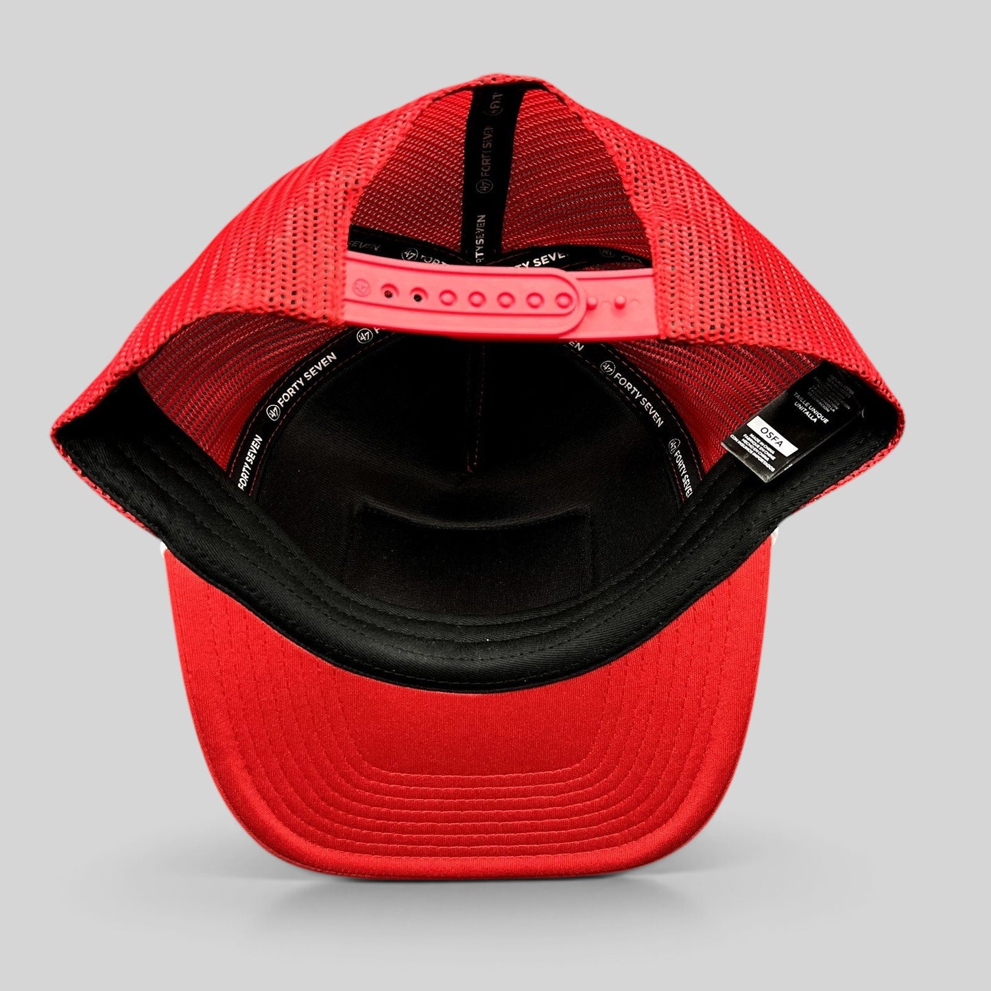 Raree Finds Wisconsin Badgers ’47 Brand red trucker snapback hat showing the interior mesh lining and adjustable strap