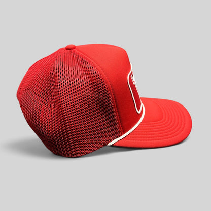 Raree Finds Wisconsin Badgers 47 Brand red trucker snapback hat with mesh back, white rope detail, and curved brim.
