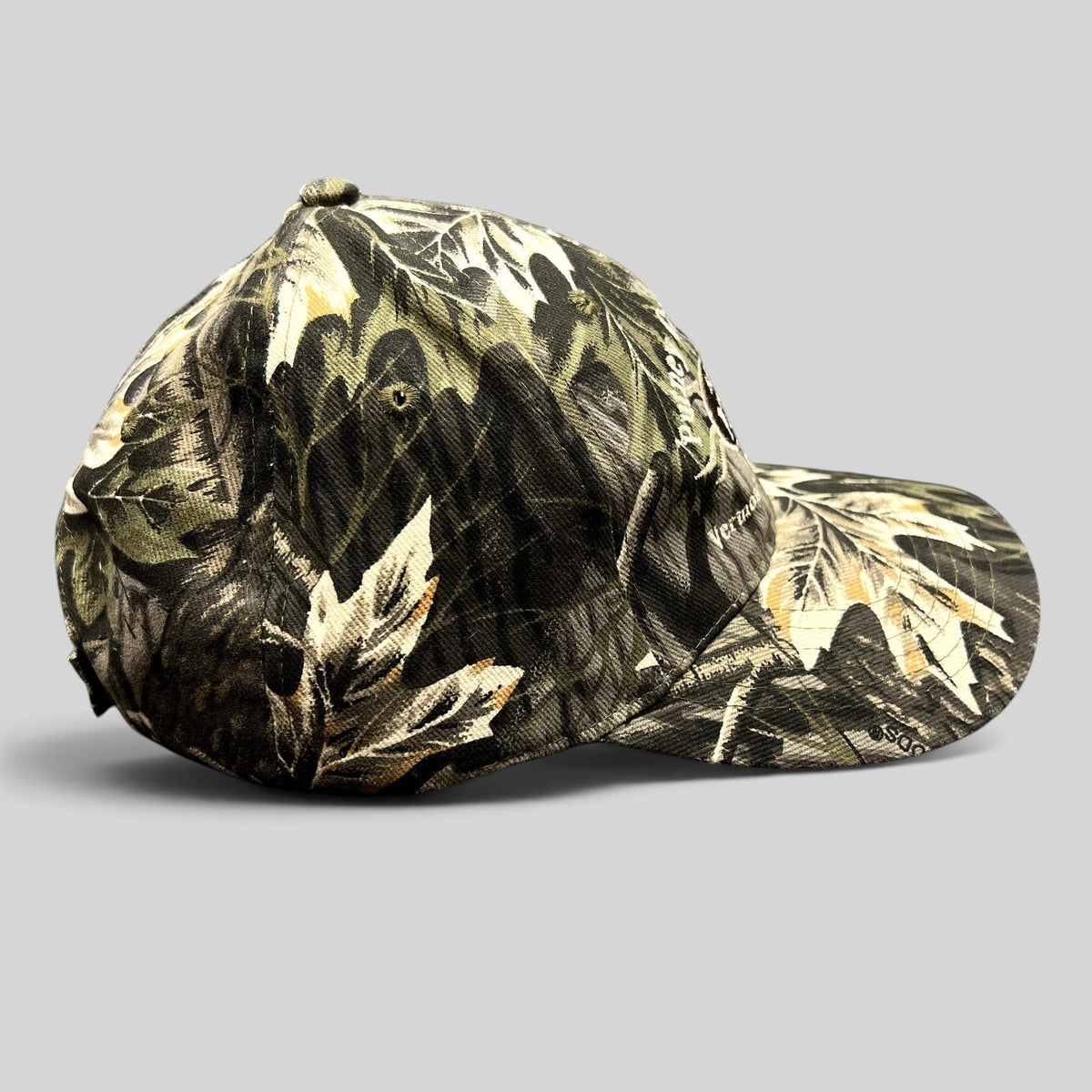Raree Finds Putney General Store woodland camouflage strapback hat with embroidered Vermont logo and curved brim