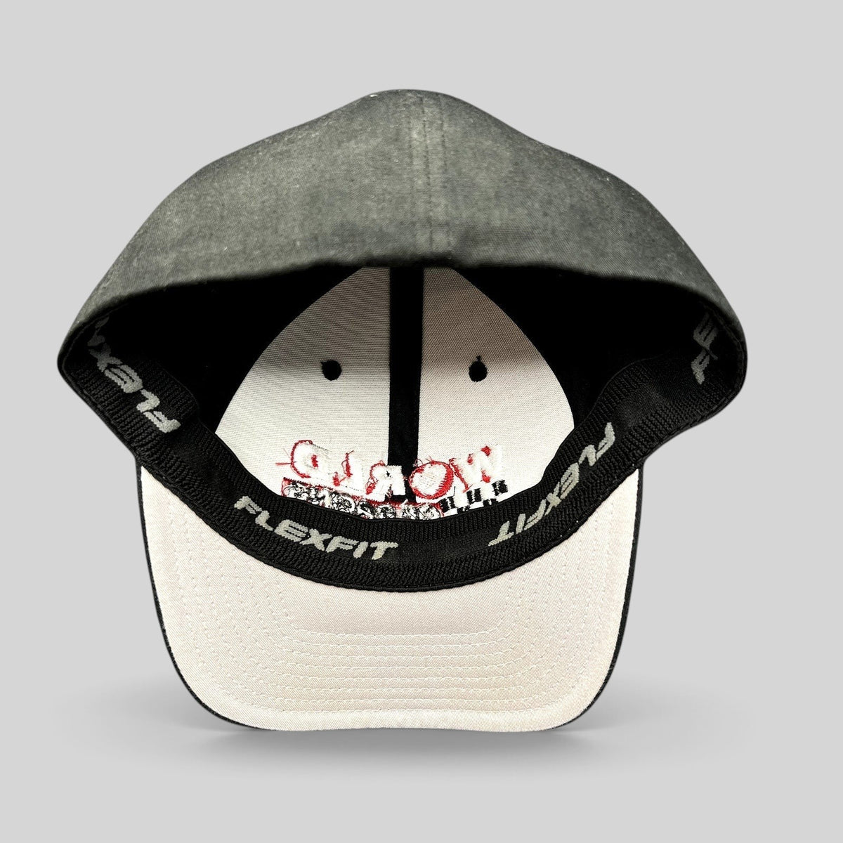 Raree Finds black Port Authority World of Racing Flexfit cap interior showing branded stretch sweatband and lining