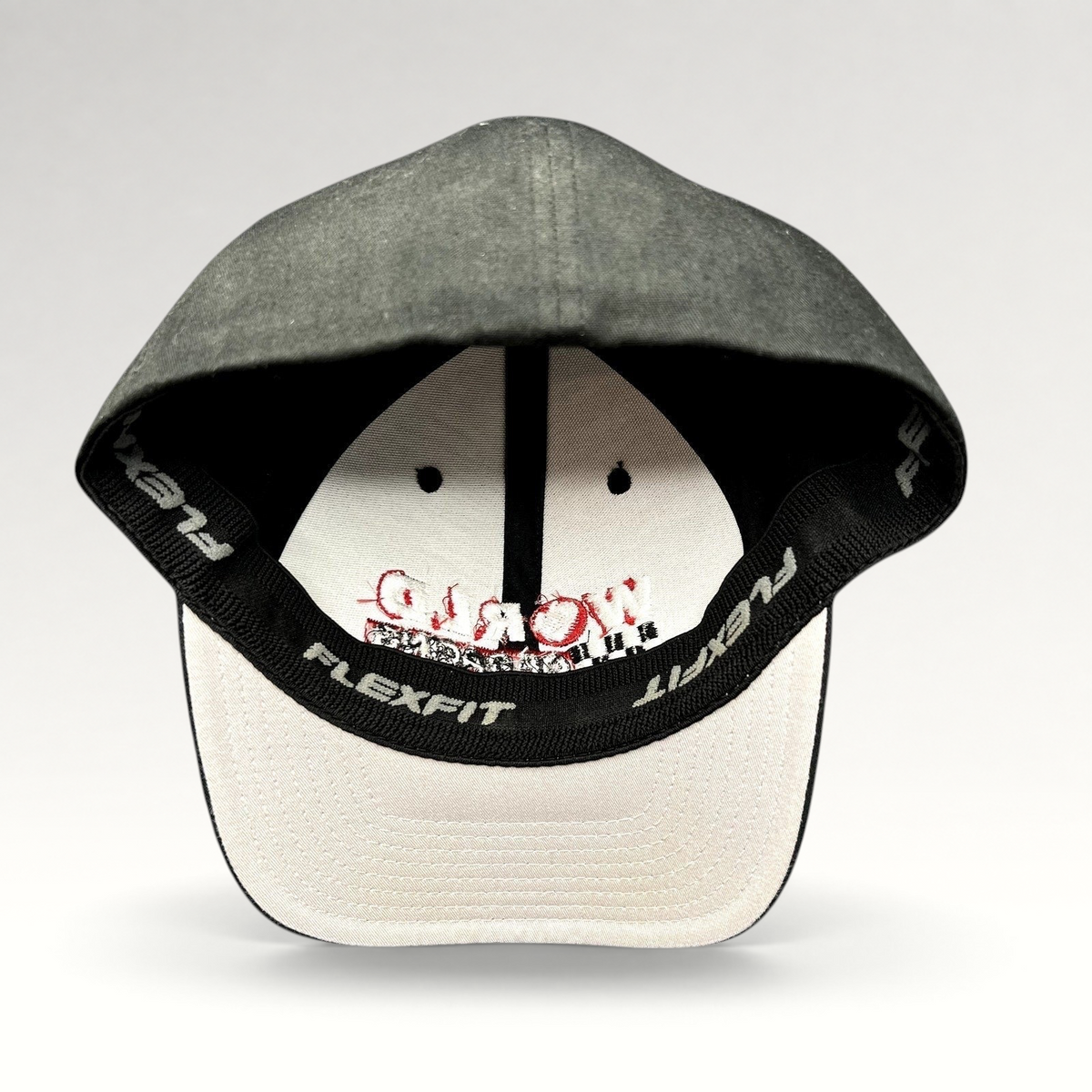 Raree Finds black Port Authority World of Racing Flexfit cap interior showing branded stretch sweatband and lining