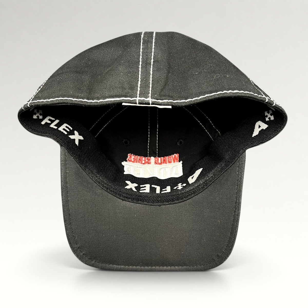 Raree Finds 2010 WSOP flexfit hat in black with white contrast stitching and interior branded sweatband detail
