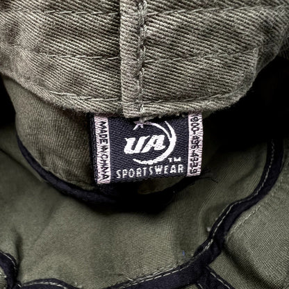 Raree Finds vintage X Games cadet cap interior tag showing UA Sportswear branding on olive green cotton fabric
