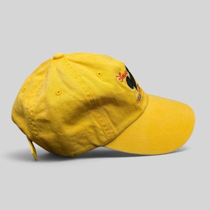 Raree Finds yellow Disney VoluntEARS cotton strapback hat with Mickey Mouse silhouette and colorful embroidery