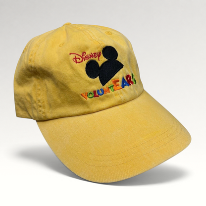 Raree Finds yellow Disney VoluntEARS strapback hat with Mickey silhouette and colorful embroidered logo