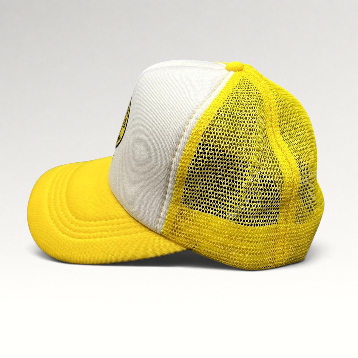 Raree Finds Gold’s Gym SoCal trucker hat in yellow and white with a breathable mesh back and adjustable snapback.