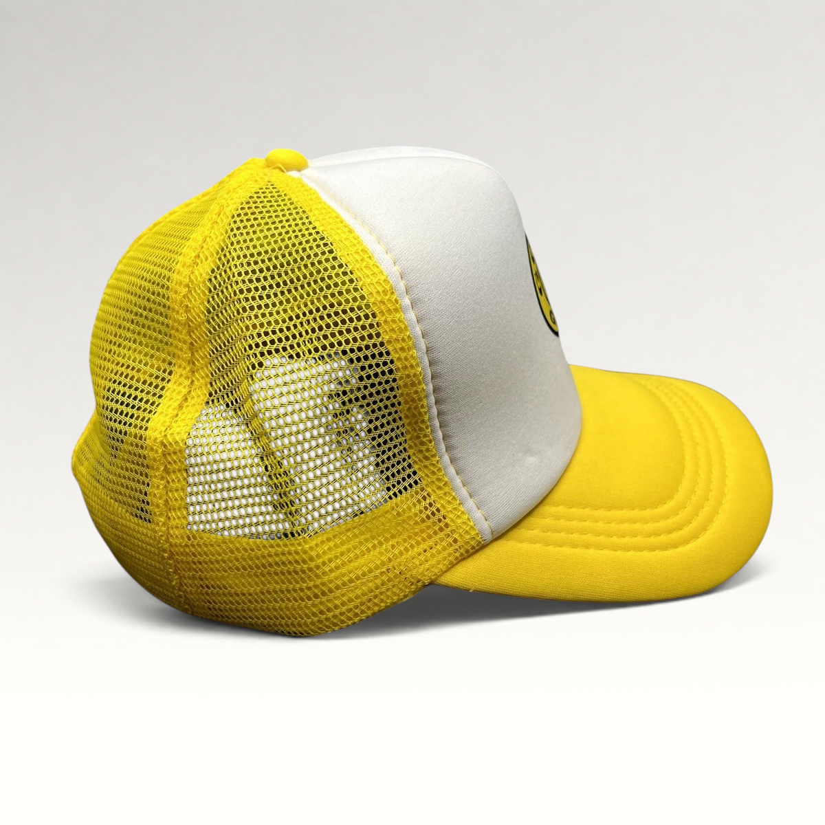 Raree Finds Gold’s Gym SoCal yellow and white trucker hat with breathable mesh back and adjustable snapback closure.