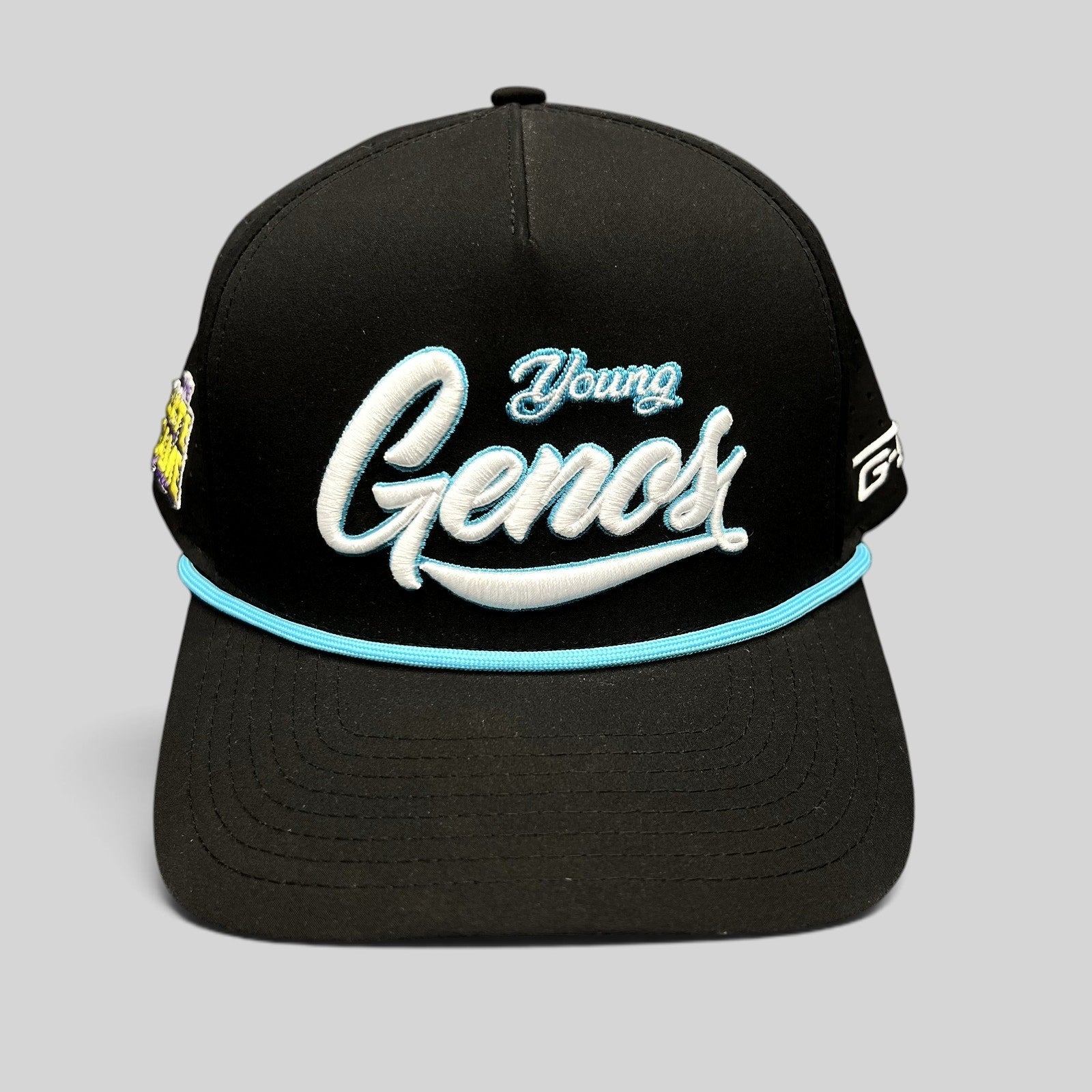 Raree Finds black Young Genos snapback hat with white and teal raised embroidery and a teal rope accent on the brim.
