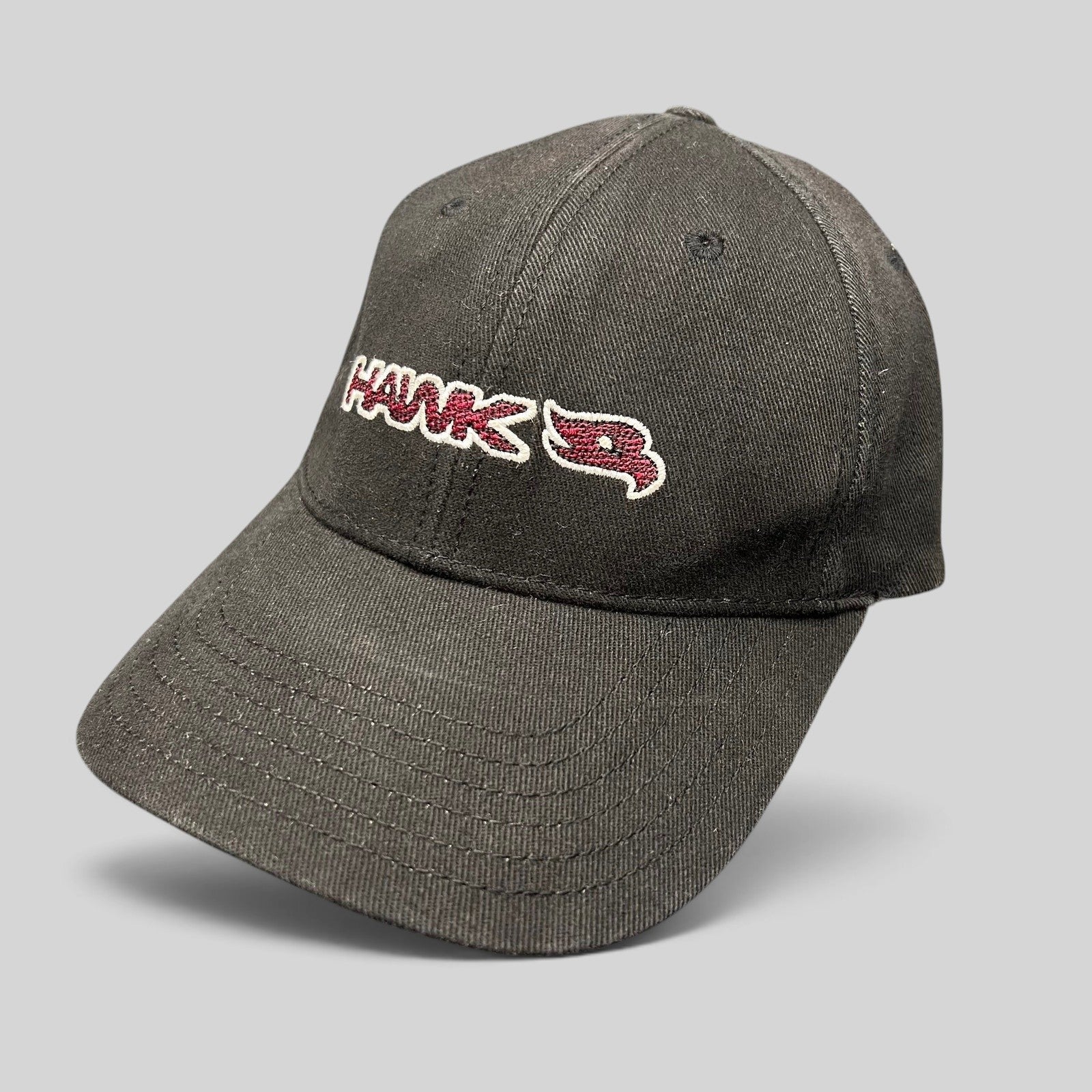 Raree Finds youth black fitted Hawk skate hat with red and white embroidered logo and bird graphic