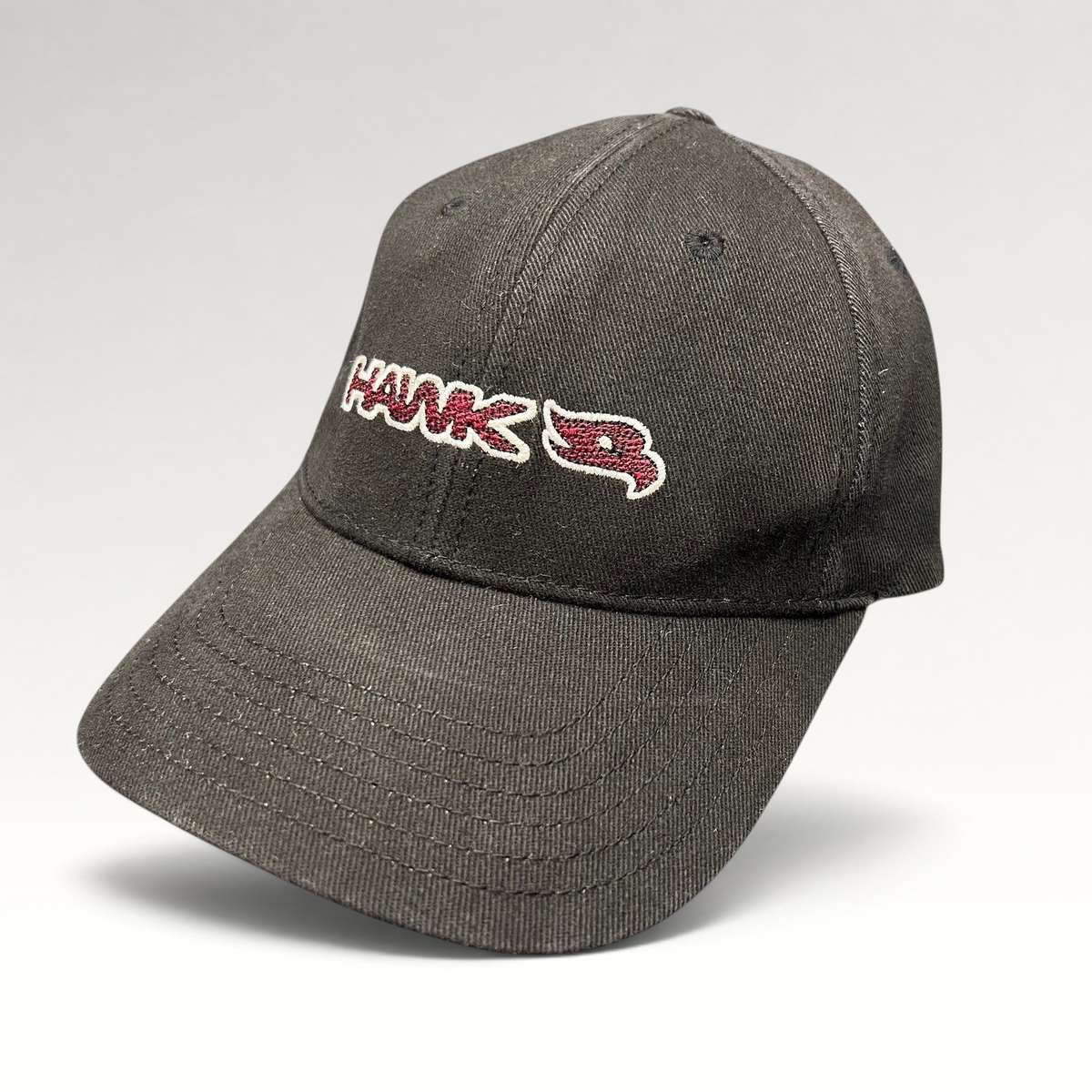 Raree Finds youth black fitted Hawk skate hat with red and white embroidered logo and bird graphic